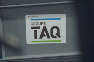 A sticker that says Property of: Groupe TAQ